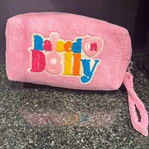 Judith March raised on Dolly Parton Pink Terry Cloth Wristlet cosmetic bag